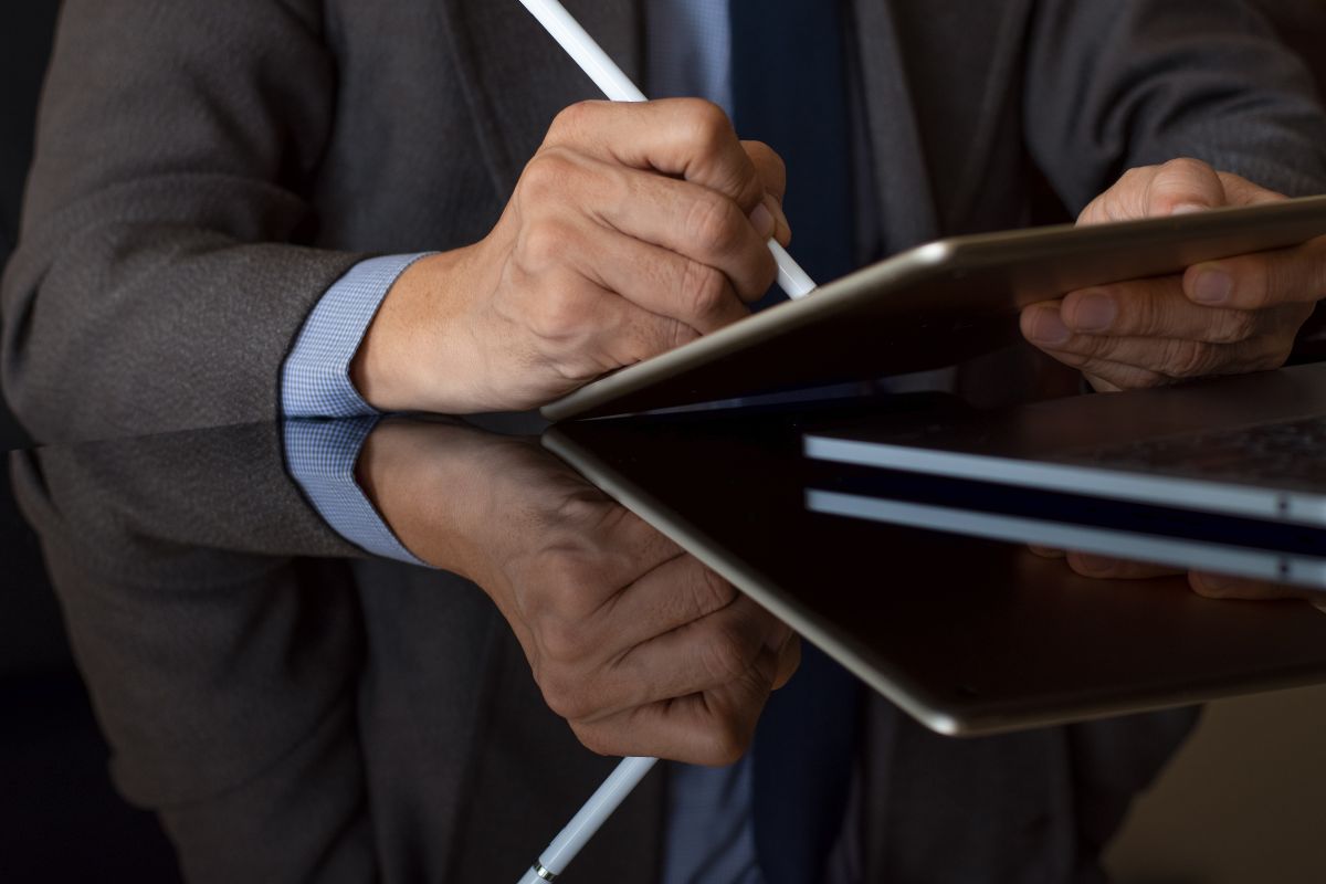 The professional is using DocuSign to sign contracts.