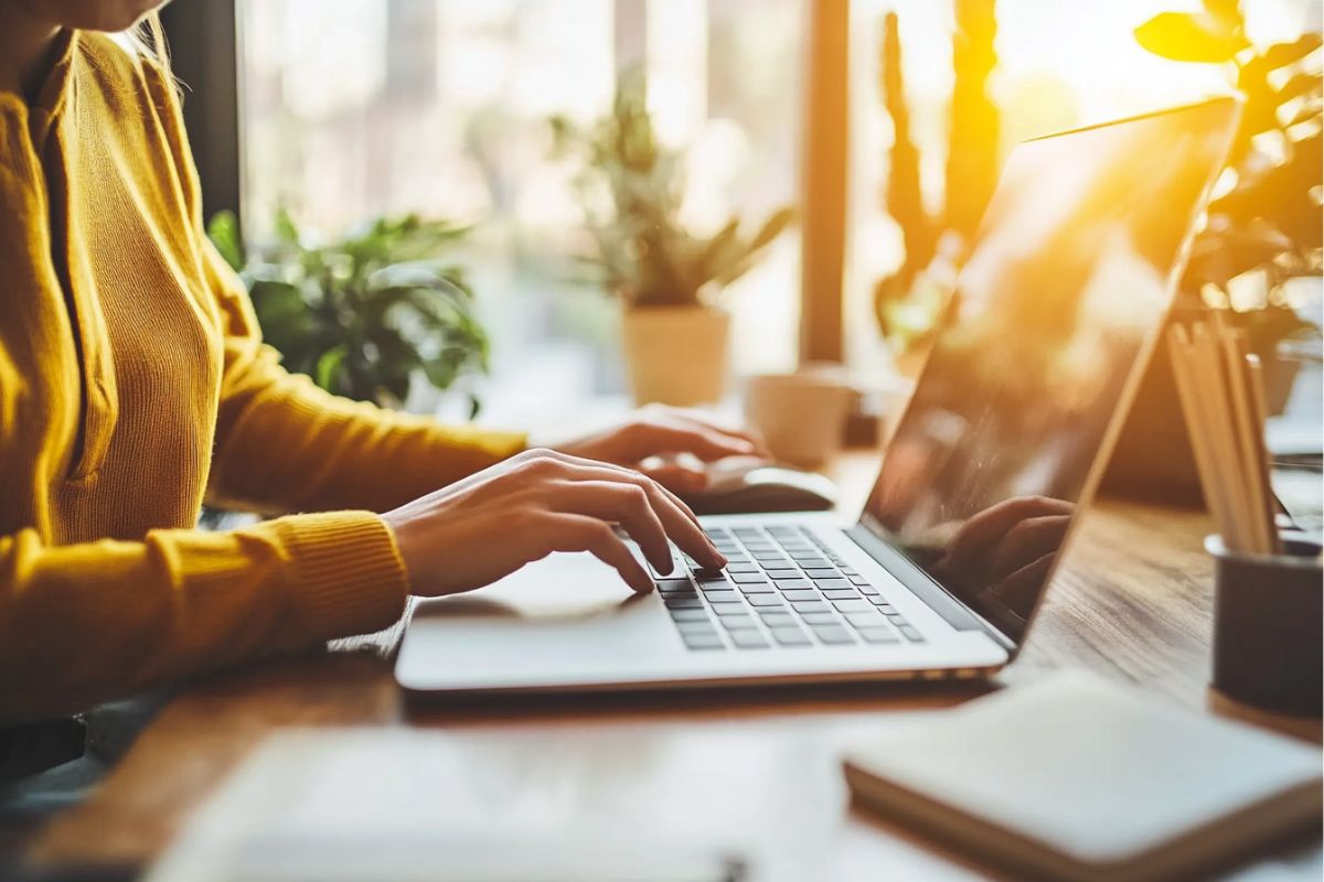 woman working on a document and adding a qualified electronic signature