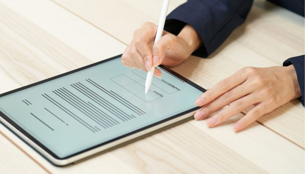 The employee uses DocuSign to sign a digital contract.