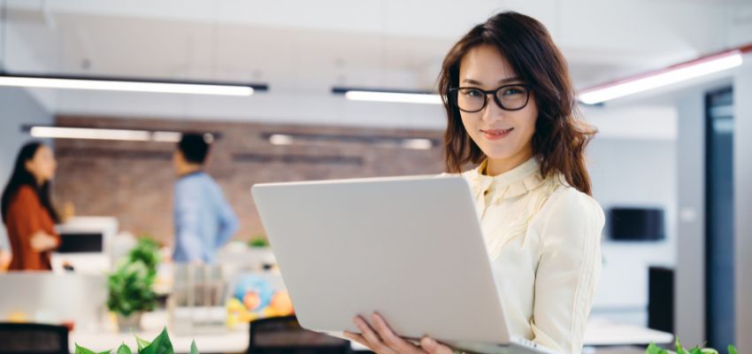 The woman is happy after she protected the company's data using a secure signing process.