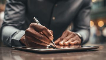 The man signed a digital contract via customized electronic signing.