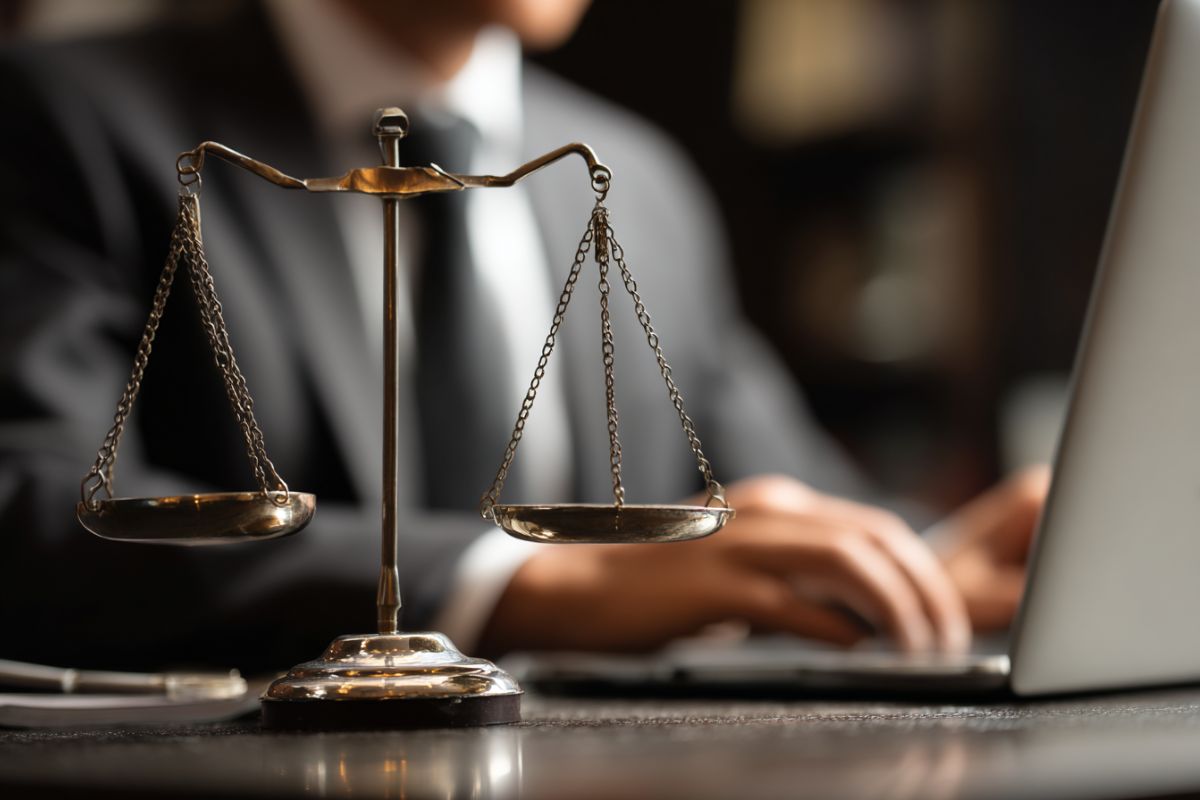 The lawyer uses legal contract management software.