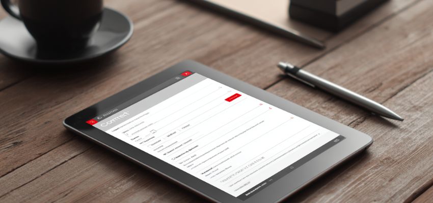 Close-up image of a tablet with a document displayed on a contract tool for digital signing.